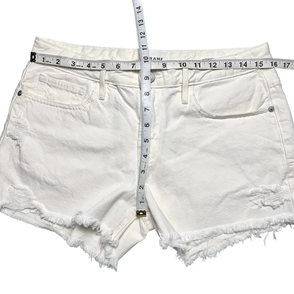 FRAME | Women | Le Grand Garcon Off White Distressed Denim Cut Off Shorts | 26 - Picture 4 of 13